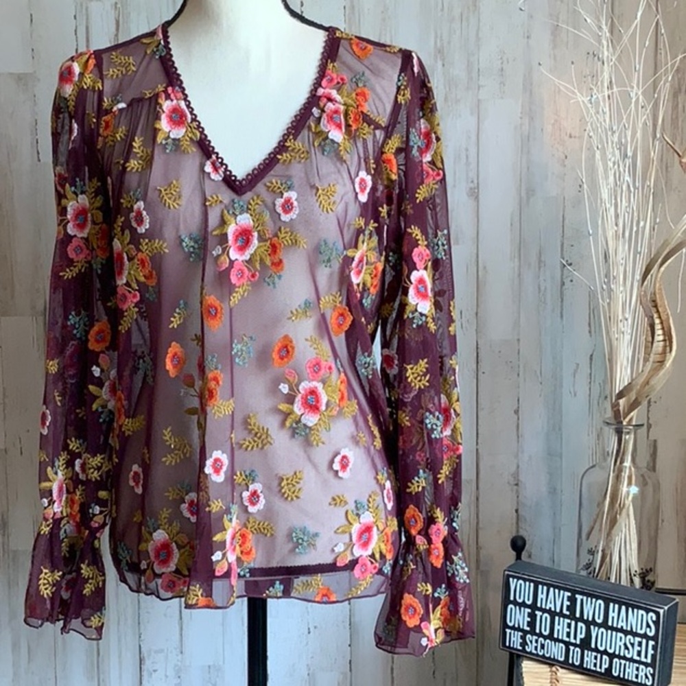 Feather Bone sheer floral embroidered v neck.